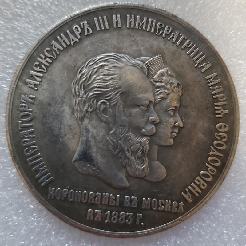

Новые памятные монеты России Александра III 1883 года из коллекции сувениров