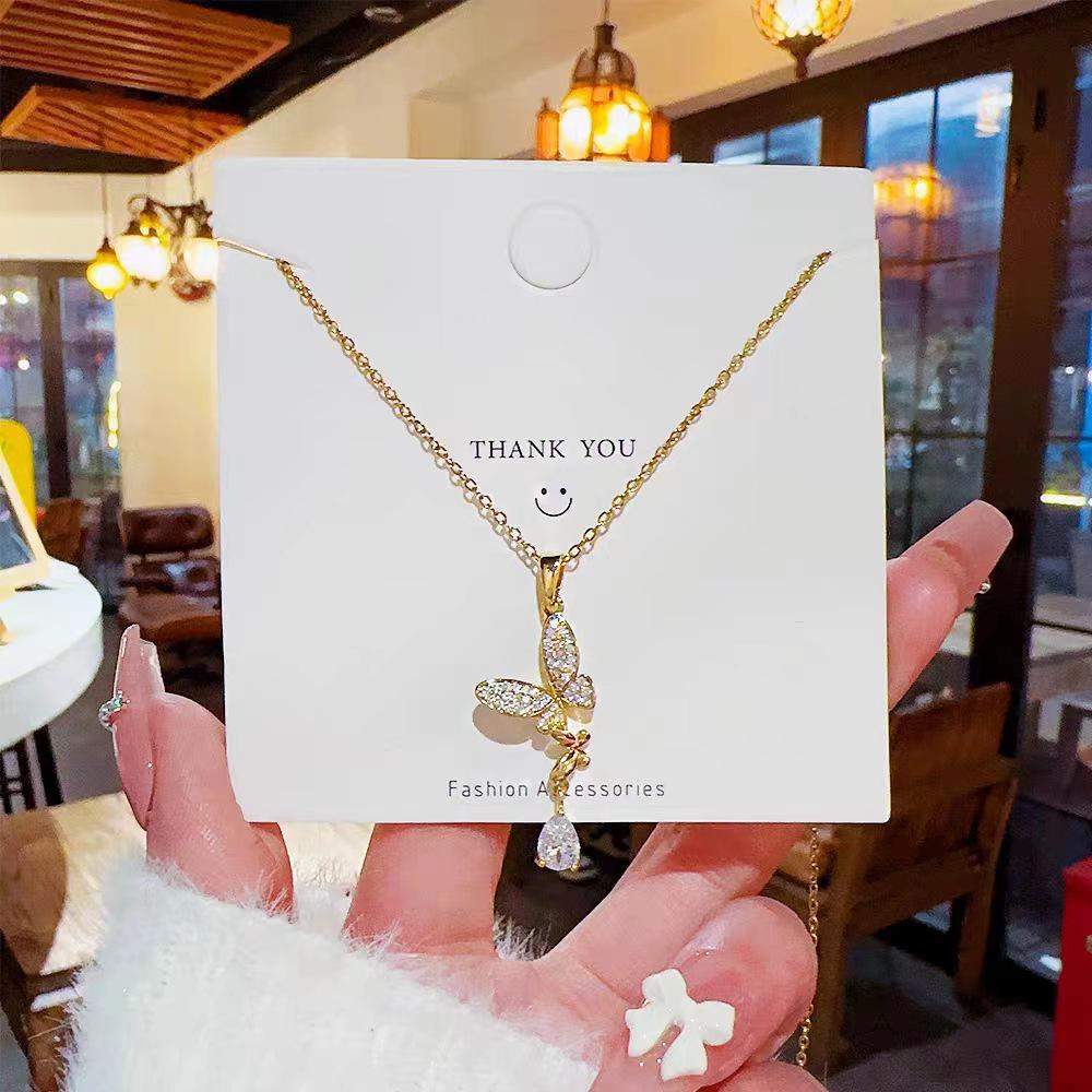 Lightweight Titanium Steel Butterfly Clavicle Necklace with Zirconia Tassel for Women