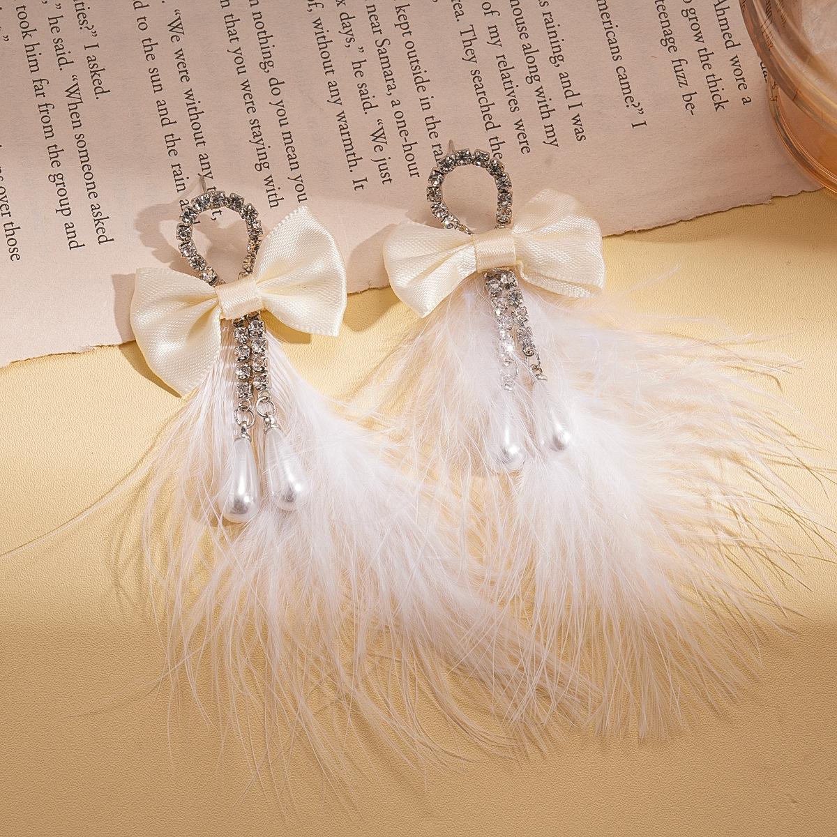 Имитация бриллианта жемчужная лента перьевой бант серебряная игла серьги осенние и зимние преувеличенные серьги