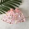 50pcs Pink Heart-Shaped Printed Organza Drawstring Bags with Golden Heart 4.72x3.54 Inches Durable Reusable Gift Bags Suitable