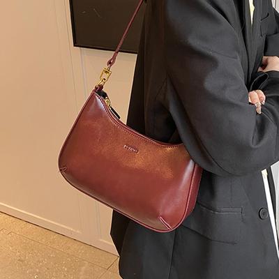 Temperament Rote Unterarmtasche Damen Neue leichte Luxus-Hochzeitshandtasche Pendler Vielseitige Umhängetaschen mit einer Schulter