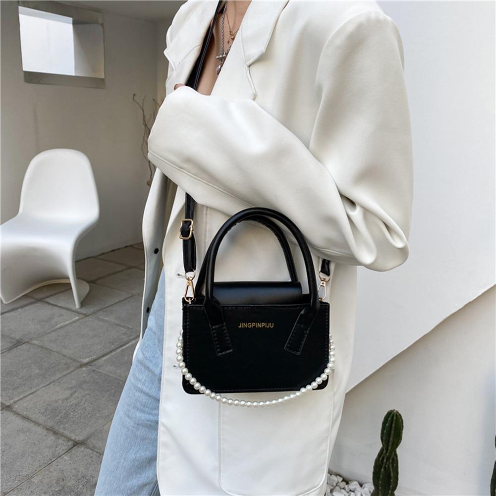 bolsa with pearl handle