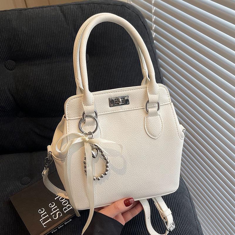 Popular Korean niche foreign style simple style portable Kelly bag women's versatile temperament commuter shoulder messenger bag