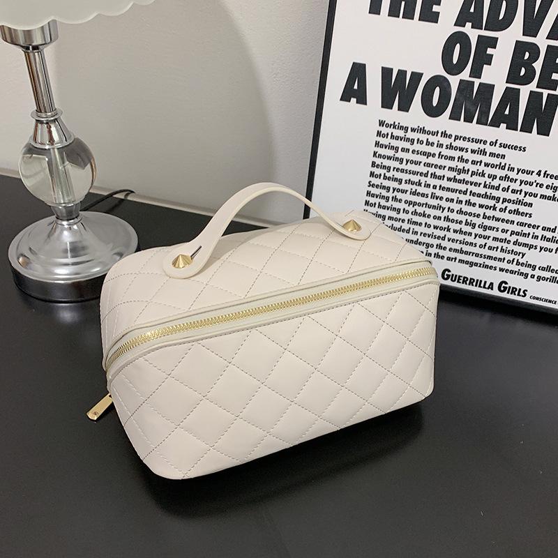 Neue hochwertige PU-Make-up-Tasche, modische und einfache gesteppte Kissen-Handtasche zur Handaufbewahrung, große Kapazität, Kulturtasche