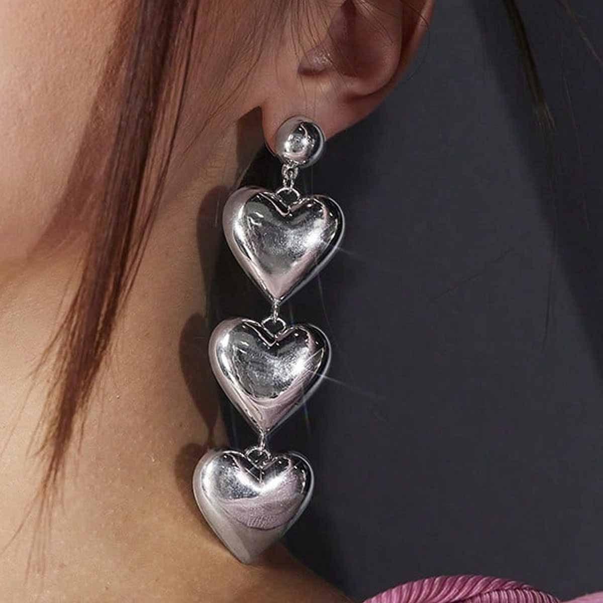 European-American Cross-Border Metallic Heart Pendant Stud Earrings with Exaggerated Design and Bright Texture серебряный