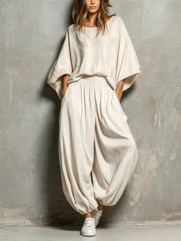 European and American women's clothing 2026 autumn and winter new fashion casual round neck loose top wide leg pants two-piece set