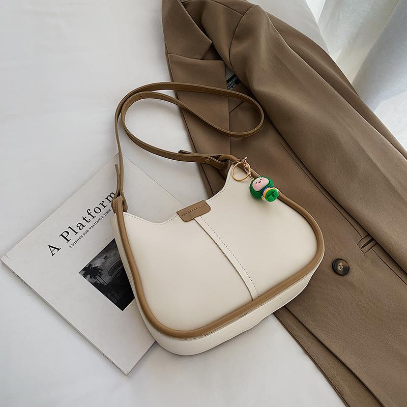 

This year s popular fashion and simple temperament messenger bag 2025 trend new foreign style texture shoulder bag women s bag simple бежевый