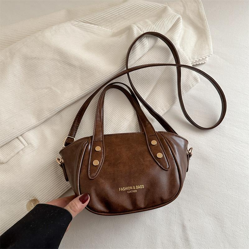 

Фактурная маленькая женская сумка весна-лето 2025, новая модная сумка-мессенджер, женская сумка-ведро с крыльями, переносная коричневый