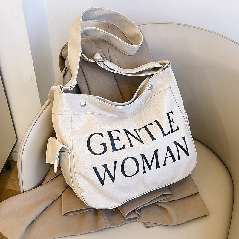 Letter large capacity canvas bag 2025 autumn and winter niche messenger bag bag