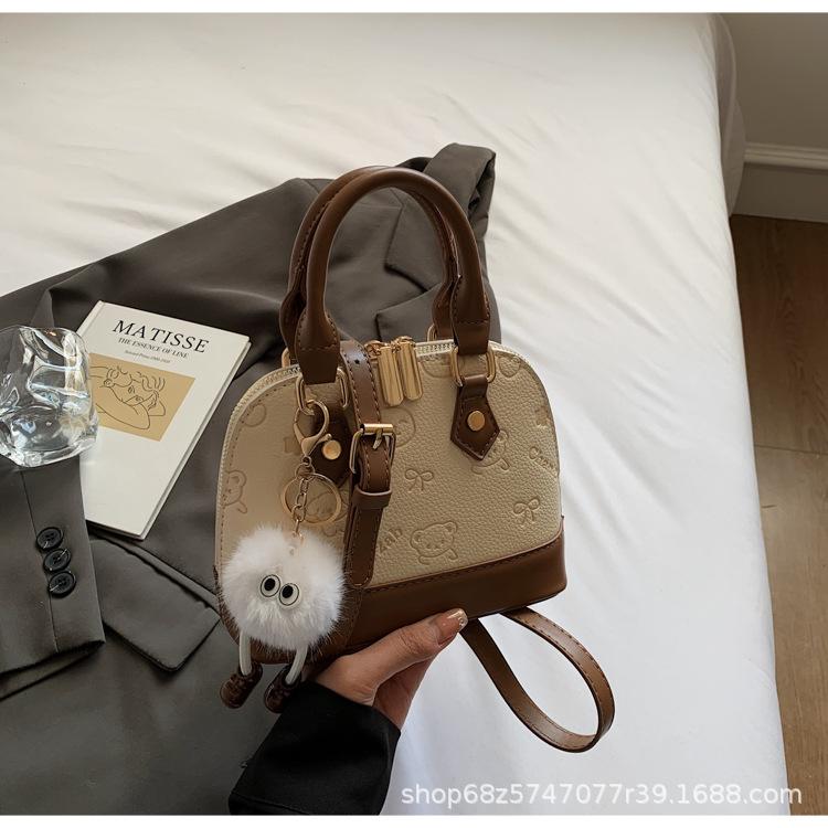 

This year s popular bag women s 2025 new shell bag high sense portable messenger versatile messenger bag foreign style