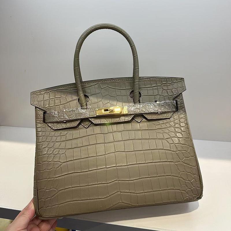 Pelle bovina primo strato motivo alligatore opaca portatile a spalla a tracolla borsa da donna premium transfrontaliera