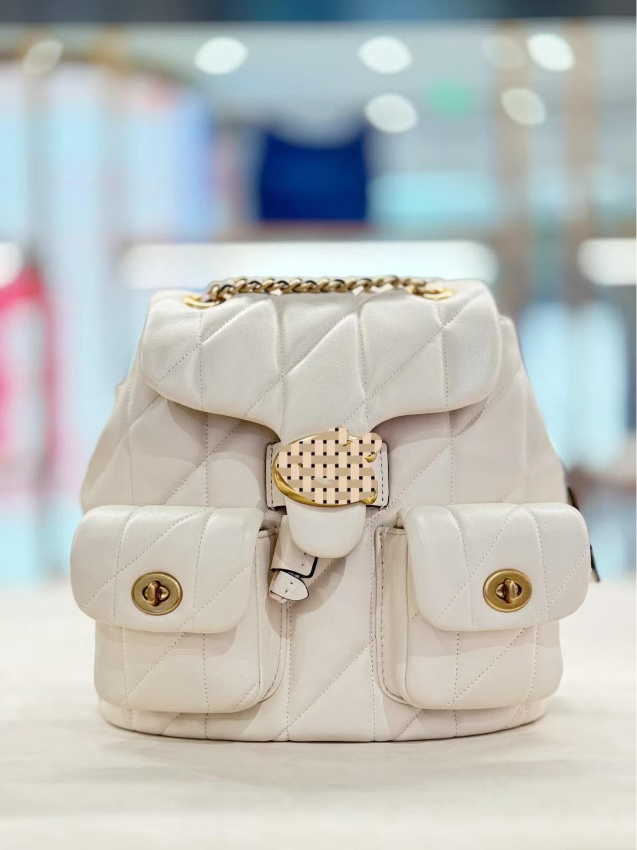 

Коко Новая Табби Винтажный Стеганый Рюкзак на Цепочке: Шикарная, Высококачественная, Универсальная Сумка Кроссбоди 21x20x10 cm белый