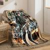 A Character with Gear Faces Dynamic Battle Scenes and Towering Titans. for All Seasons Blanket Lunch Break Throw Gift