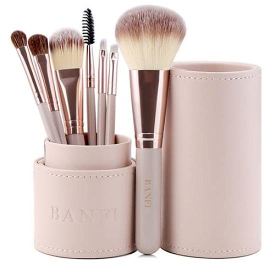 

Stylish and popular makeup brush set with case and made of Pink 7-piece stand, leather. beige. рожевий
