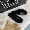 Leather niche row style one-word slippers women's outer wear summer new comfortable flat bottom soft bottom beach half tray sandals