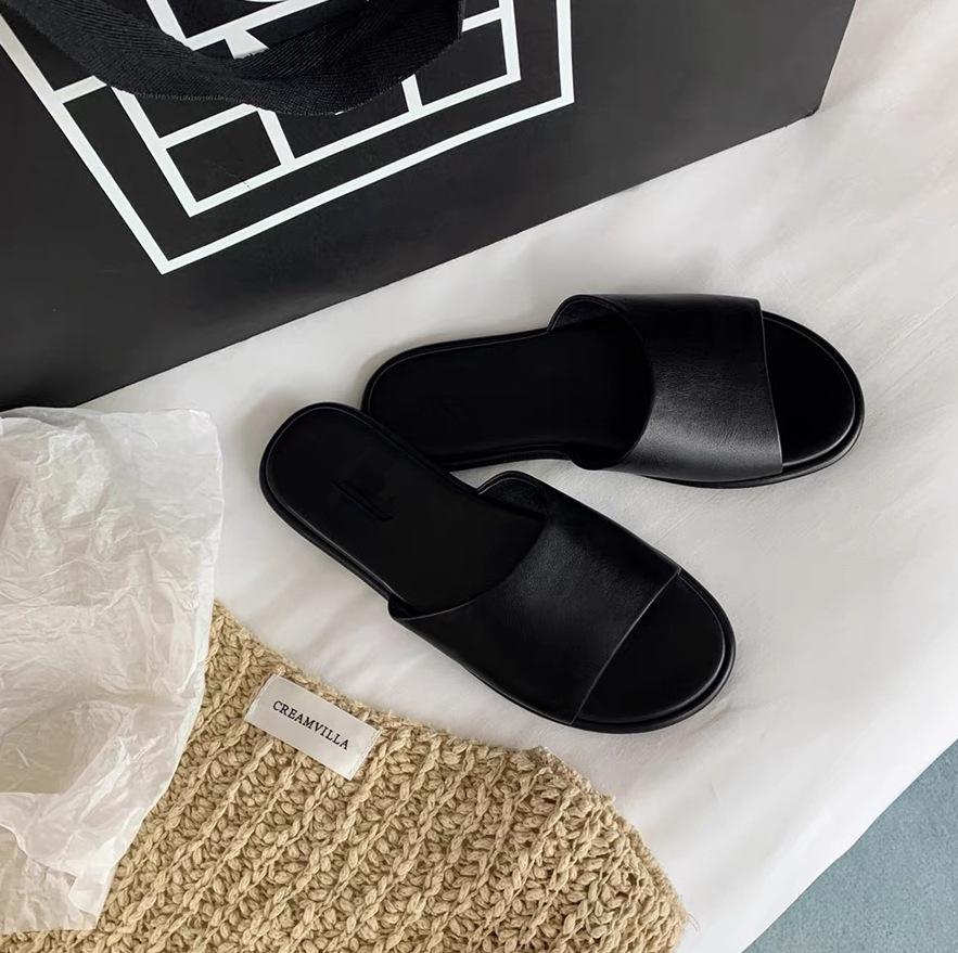 Leather niche row style one-word slippers women's outer wear summer new comfortable flat bottom soft bottom beach half tray sandals