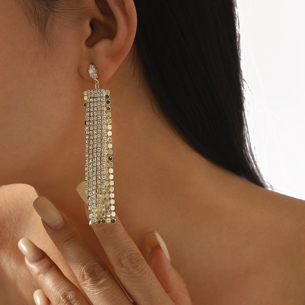 

Модные серьги-подвески для женщин золотой