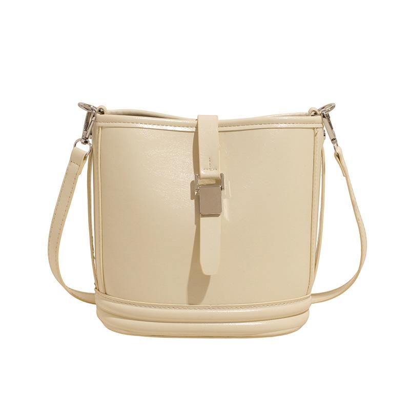 Korean new product, sweet and light color, gentle wind temperament bucket bag, women's commuting versatile and advanced messenger bag