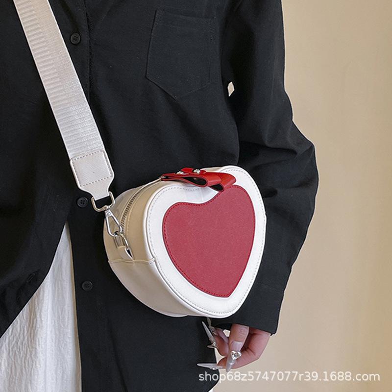 Women's bag 2025 new trendy fashion messenger bag simple foreign fashion popular women's bag shoulder bag cute peach heart small bag