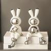 2 st kaninstatyer djurfigurer prydnad nordisk astronautform skulpturer för bokhylla