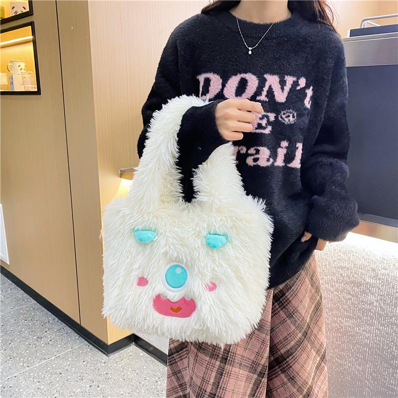 Toamnă și iarnă drăguț urât drăguț geantă de pluș femeie de mare capacitate student dopamină desene animate drăguț plus geantă de umăr maree