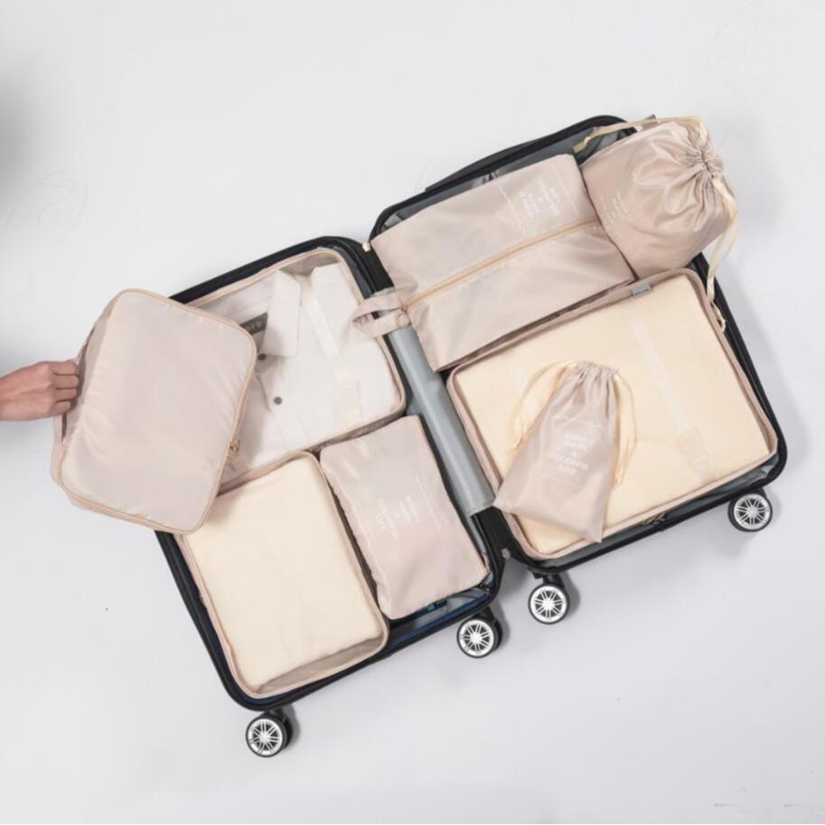 

7-Piece Waterproof Travel Storage Bag Set for Clothes, Shoes, and Cosmetics