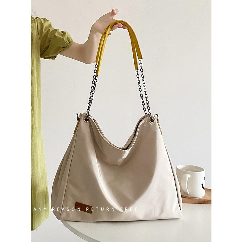 

Большая вместительная сумка-тоут для женщин 2024 года, новинка, простая холщовая сумка, модная универсальная нейлоновая сумка-мессенджер через плечо белый