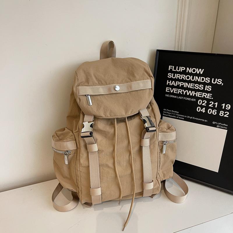 Niche design backpack female college students large-capacity travel backpack Japanese simple commuter high school students schoolbag tide