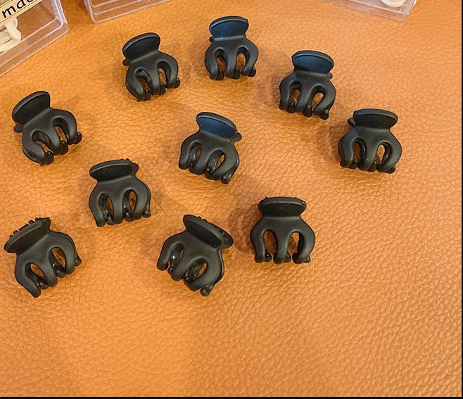 

Черная маленькая заколка-акула для высокого хвоста и фиксированной боковой челки