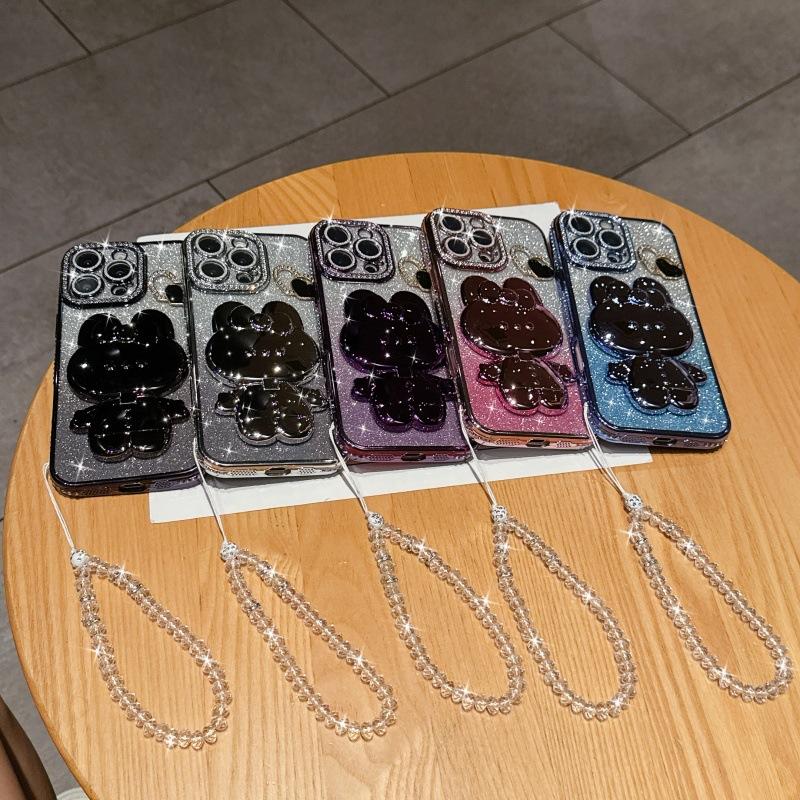 Applicable to iPhone17 mobile phone case electroplated rhinestone glitter Apple 16 rabbit mirror holder 15 crystal bracelet 14