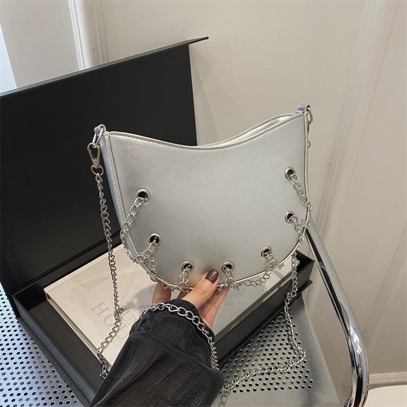 New Temperament Metal Chain Bag  Air-eye One-shoulder Crossbody Bag, Fashionable   Cool and Personalized French Saddle Bag