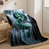 A green, serpentine dragon with glowing eyes emerges amidst misty cliffs. for all seasons blanket lunch break throw gift