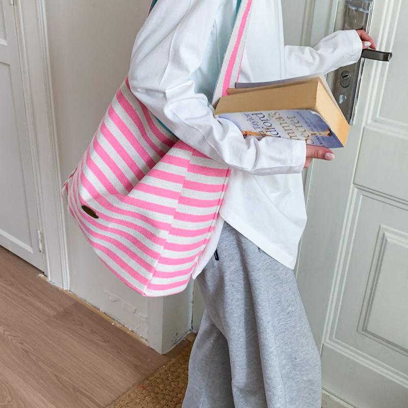 

Casual large-capacity striped canvas bag women s new lightweight and versatile shoulder bag fashion tote bag розовый