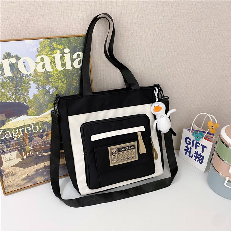 Canvas bag new large-capacity make-up bag dual-purpose tote bag women's schoolbag students junior high school high school canvas messenger bag