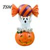 Halloween Party Supplies Ghost Figurine, Cute Sitting on Pumpkin Holding Candy Non Scary Holiday Decor Statue, Spooky Resin Table Ornament for Indoor