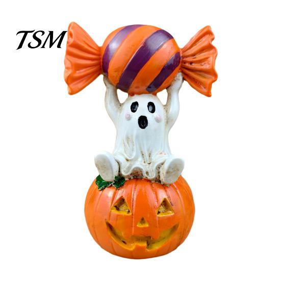 Halloween Party Supplies Ghost Figurine, Cute Sitting on Pumpkin Holding Candy Non Scary Holiday Decor Statue, Spooky Resin Table Ornament for Indoor
