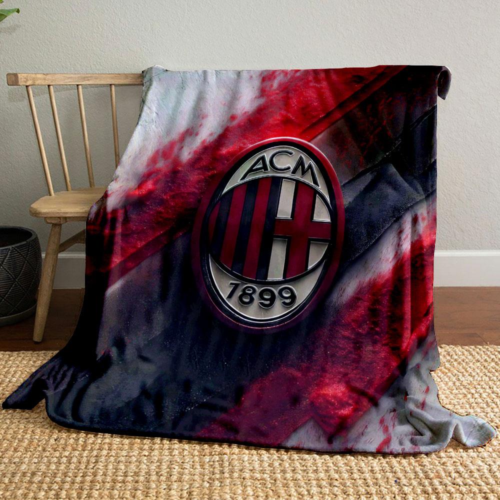 Red and black textured diagonal streaks with a central oval emblem. for all seasons blanket lunch break throw gift