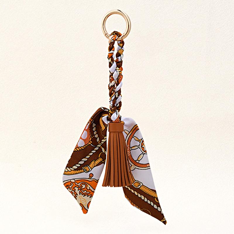 Femme Alliage Tissé à la Main Polyester Pendentifs Sac Cadeau Créatif Porte-clés Supports Ornement Ruban de Soie Porte-clés Personnalité 9 Couleurs