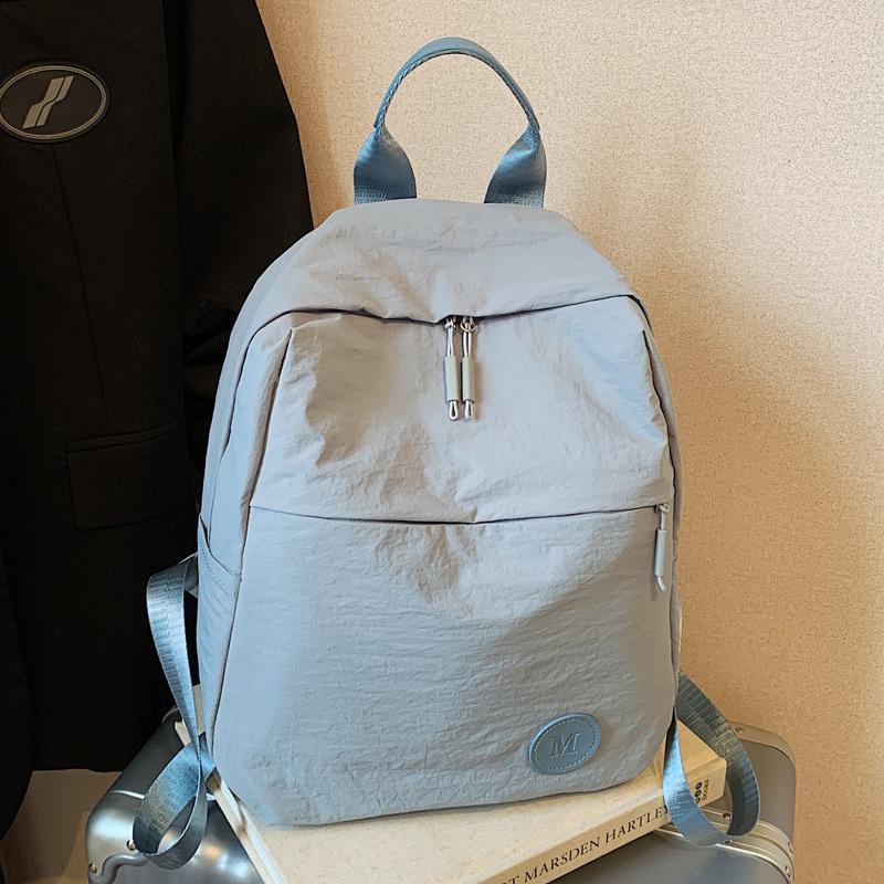 Large capacity bag new simple casual versatile backpack female college student schoolbag lightweight travel backpack