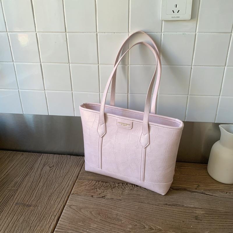 

Large-capacity tote bag women s 2025 Korean version of the new high-end textured stone pattern light luxury versatile portable shoulder bag