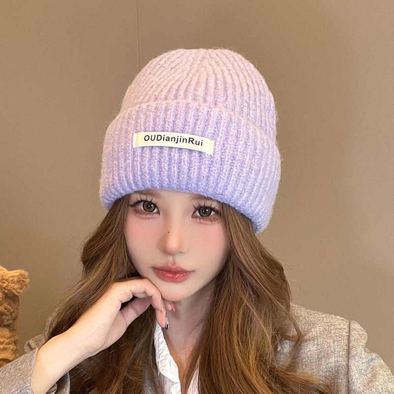 

Autumn and winter white face small ear protection hat Korean version fashion big head knitted hat
