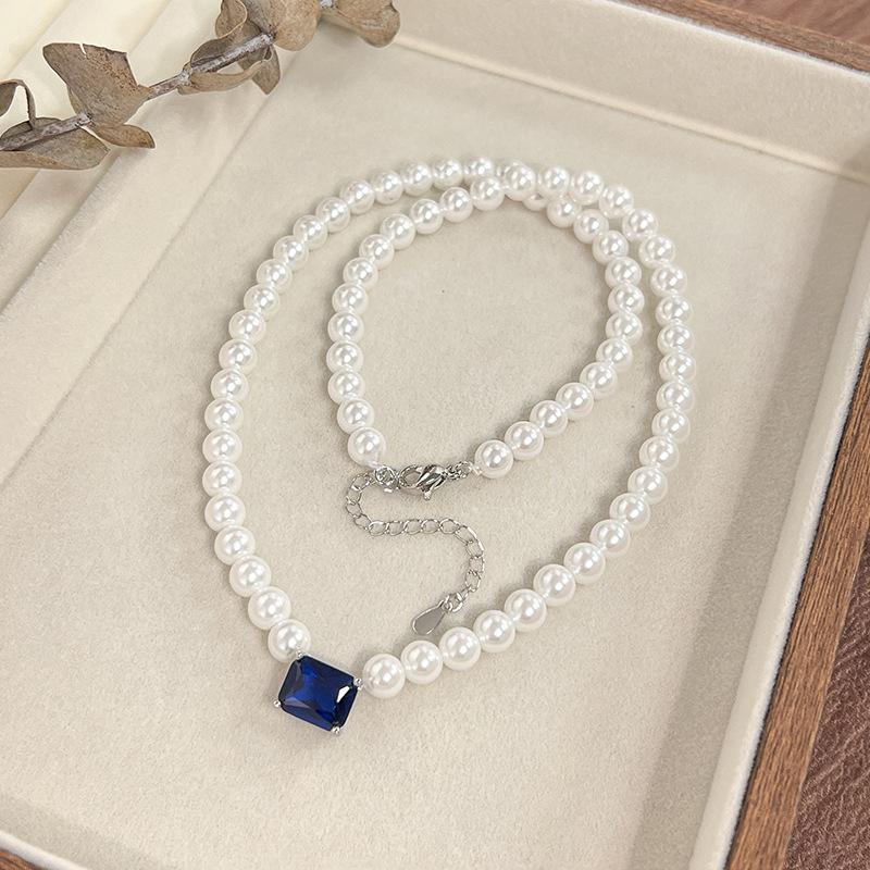 

Имитация ожерелья из австралийского белого жемчуга, кулон из сапфира цвета «голубиная кровь», женская легкая роскошь и элегантность