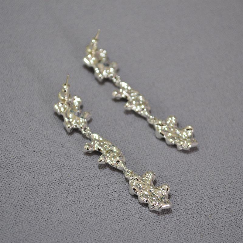 

Liquid Metal Style Lava Texture Stud Earrings with 925 Silver Needle