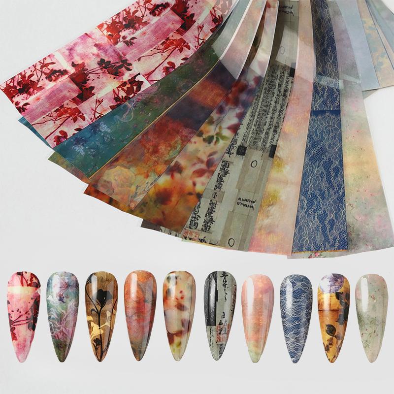 10 Sheets Feng Shui Ink Staining Nail Foils Transfer Paper Laser Nail Art Stickers Decal Pattern Printing Mold Manicure Tool