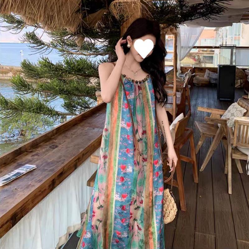 Seaside vacation floral suspender dress women's new French retro bohemian ethnic style beautiful medium and long dress