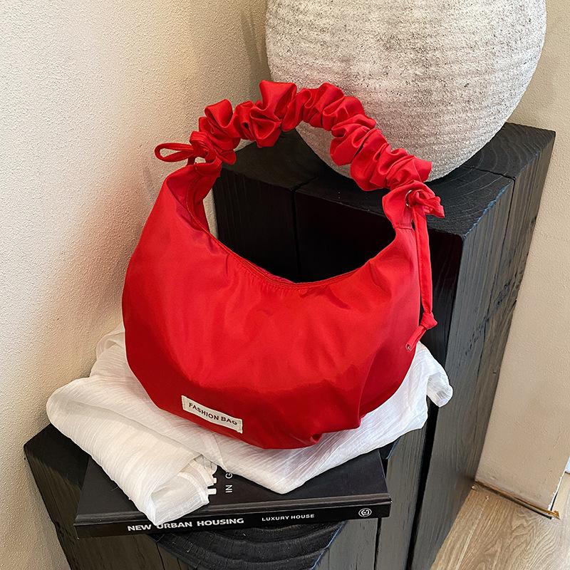 Niche underarm bag new versatile solid color shoulder messenger bag pleated dumpling tote bag women