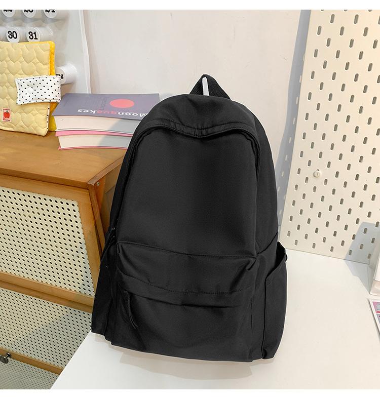 School bag new fashion solid color large capacity school bag Korean version ins versatile simple backpack casual spring outing light backpack
