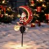 Retro Style Garden Art 31 Inch Solar-Powered Christmas Stake Light, Santa Claus on A Moon LED Pathway Auto Solar Powered Lamp Light with Snowflake