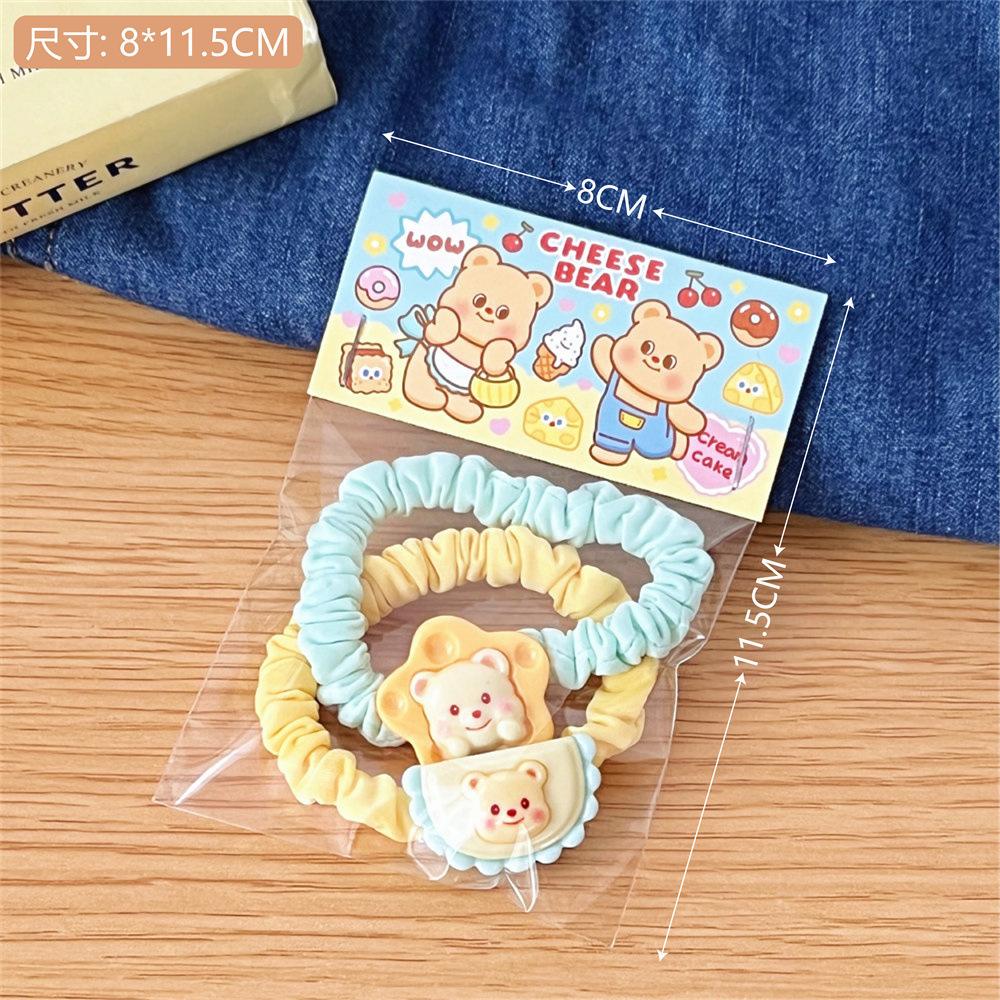 

Детский милый набор аксессуаров для волос серии «Молочно-желтый медвежонок» включает в себя сладкие челки для маленьких девочек и высокоэластичные резинки и ободки для волос.