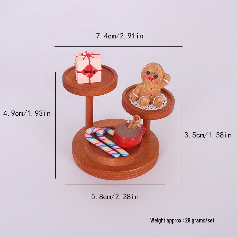 Dollhouse Christmas Scene: Cookie People, Candy Cane Decorations, Coffee Ornaments, and Edible Toys on Three-Tier Stand.